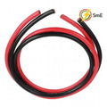 Coiled red and black 1m 25mm battery cables with crimped lugs